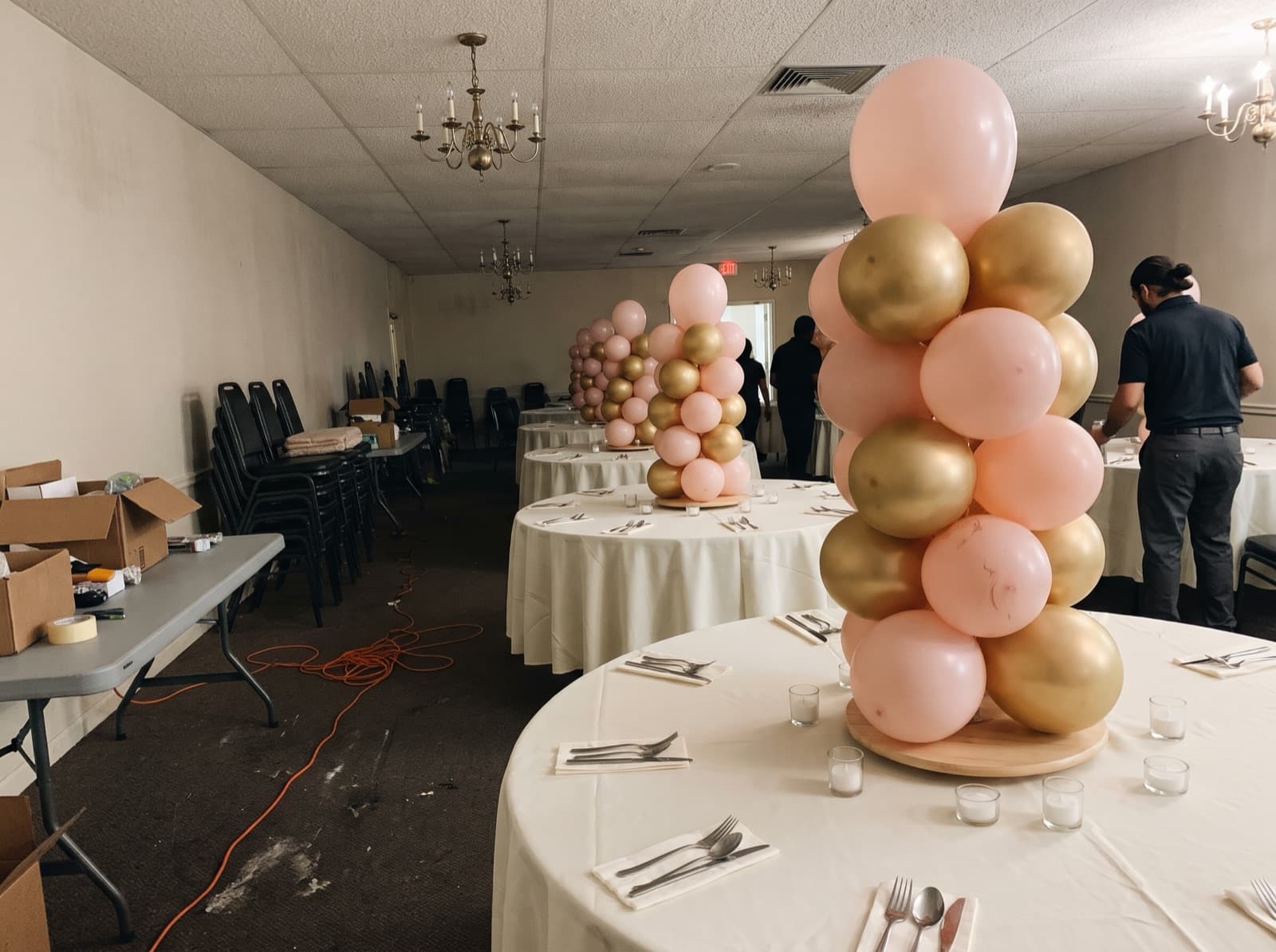 Mini tabletop balloon columns as centerpieces