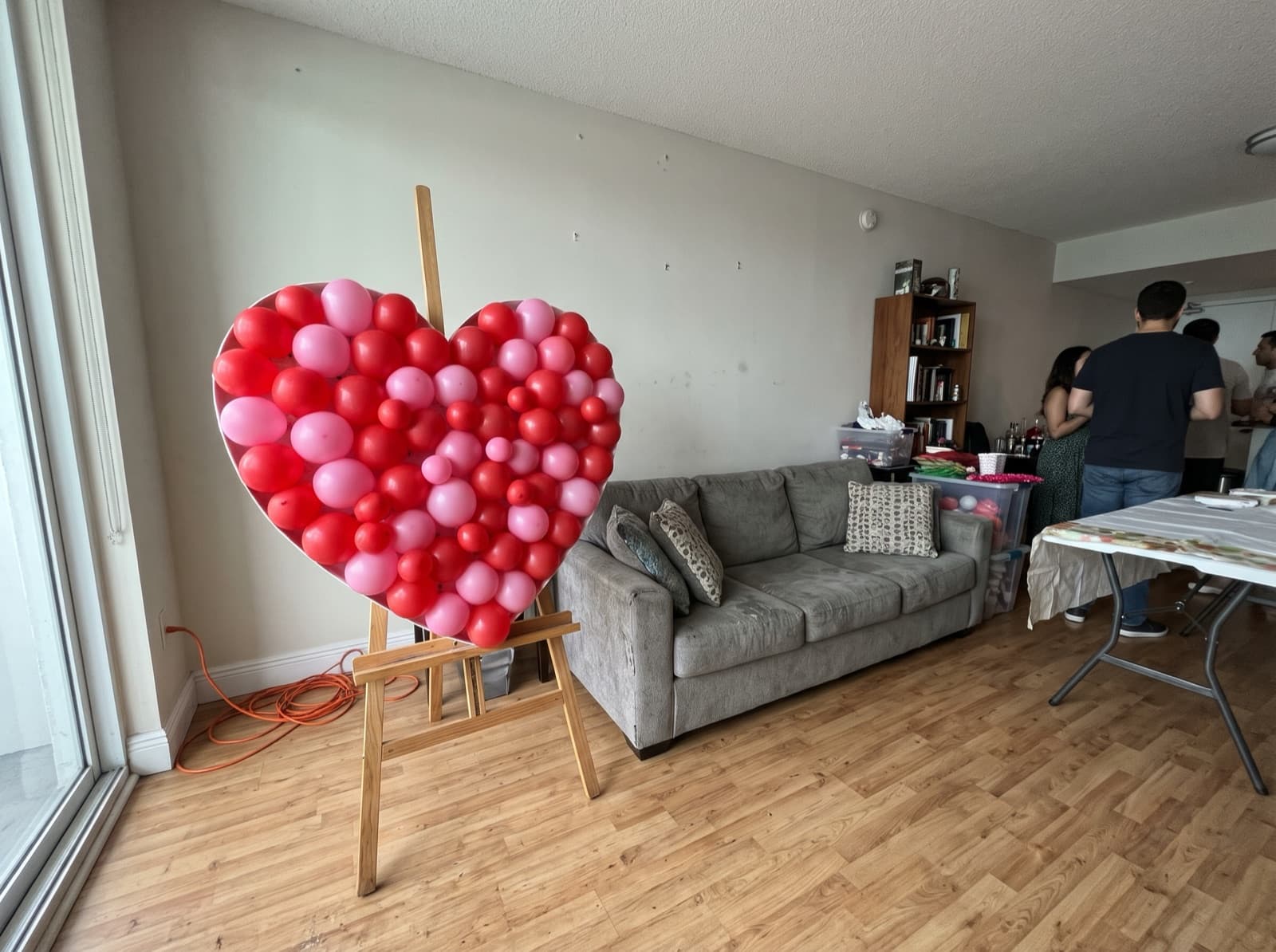 Red and pink balloon mosaic in a heart shape